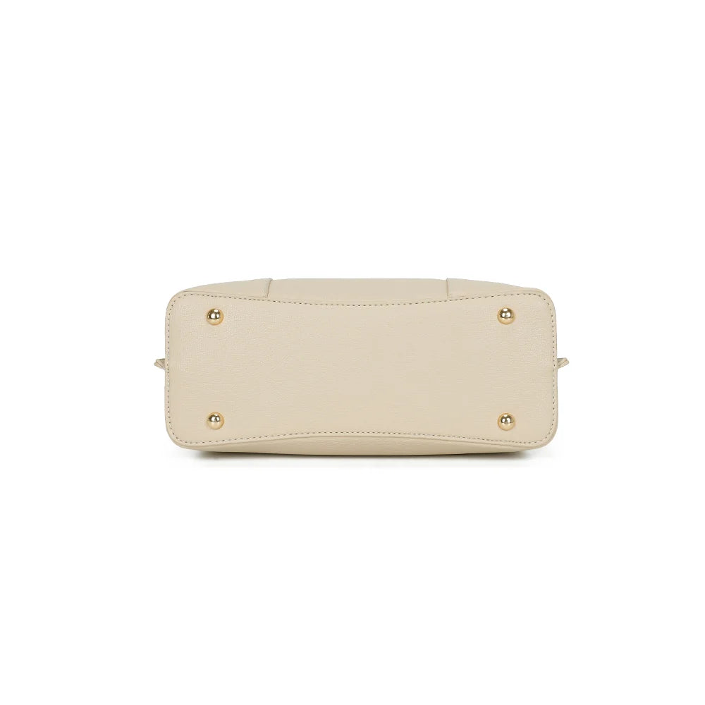 Dessous du sac Abyss beige, base plate protégée par des pieds métalliques dorés – réf. DQ-8699