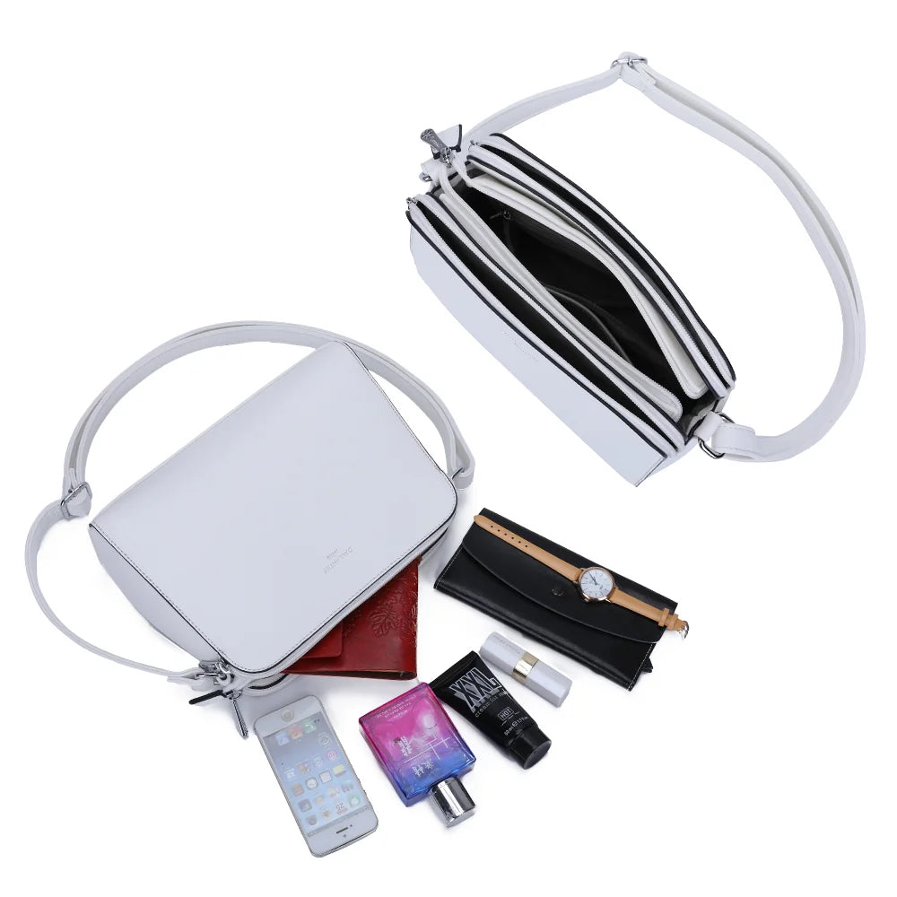Intérieur du Gallante blanc : plusieurs compartiments zippés pour ranger téléphone, carnet et maquillage – réf. G-7432-2