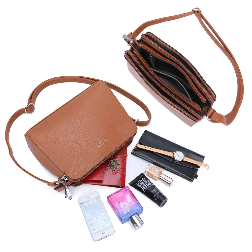 Intérieur du Gallante marron : plusieurs compartiments zippés pour ranger téléphone, carnet et maquillage – réf. G-7432-2