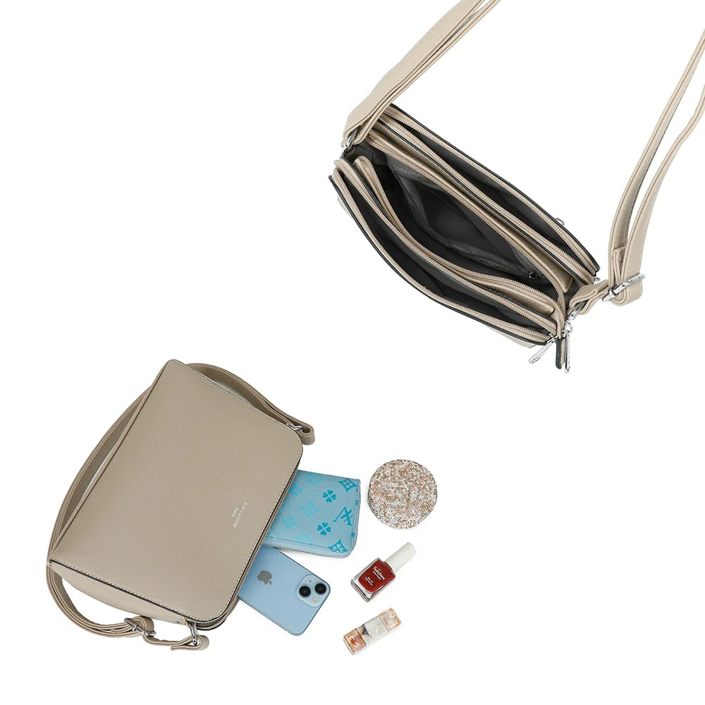 Intérieur du Gallante taupe : plusieurs compartiments zippés pour ranger téléphone, carnet et maquillage – réf. G-7432-2