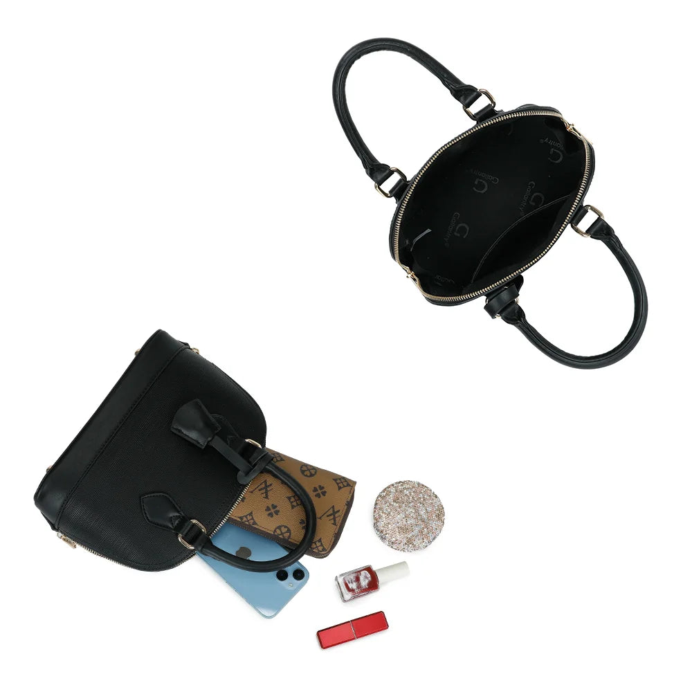 Intérieur de L'Éclat Mini noir : compartiment zippé avec poche plaquée pour le téléphone et l’essentiel – réf. DQ-8596-5