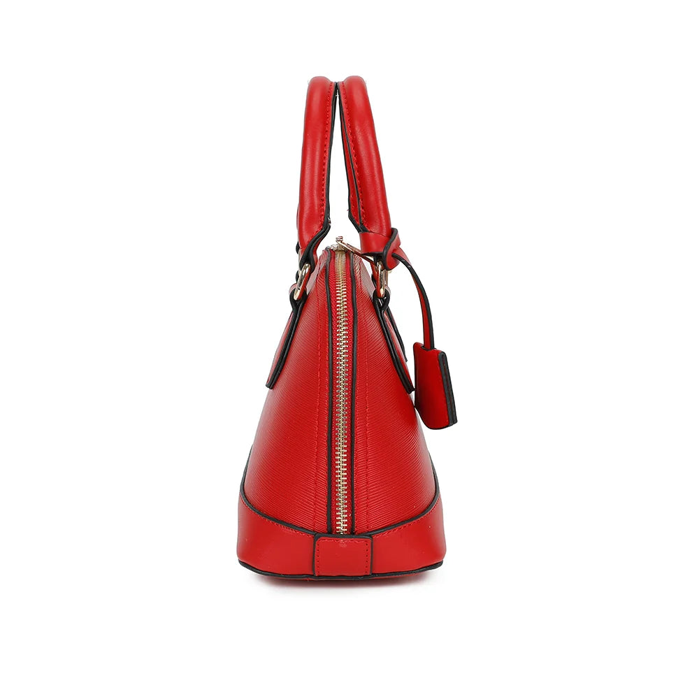 L'Éclat Mini rouge de profil : fermeture éclair qui suit l’arrondi du sac sur les côtés – réf. DQ-8596-5