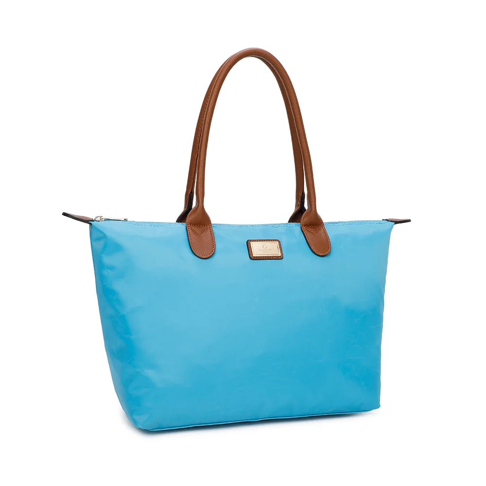 La Balade (Large) bleu ciel vu de trois quarts : forme cabas évasée et pattes de zip marron surpiquées – réf. Z-02