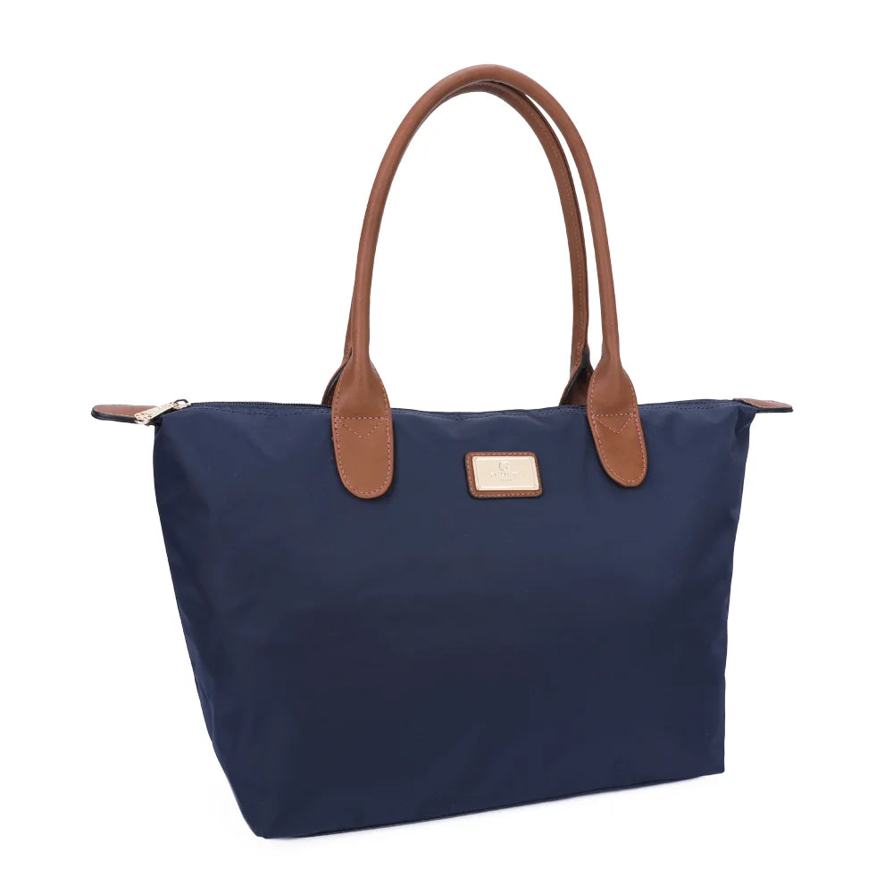 La Balade Medium bleu marine vue de trois quarts : silhouette évasée et pattes marron aux extrémités du zip – réf. Z-03