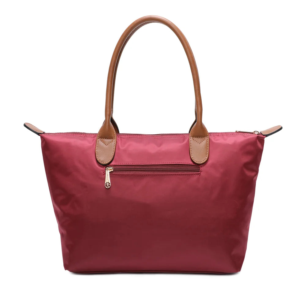 Dos de La Balade Medium bordeaux : nylon uni et anses marron surpiquées cousues sur le haut du sac – réf. Z-03