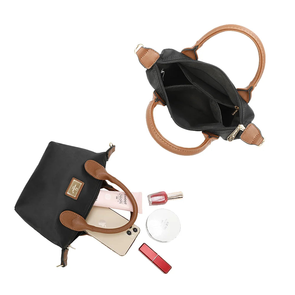 Intérieur zippé de La Balade (Mini) noir : doublure synthétique grise et poche intérieure plaquée – réf. Z-05