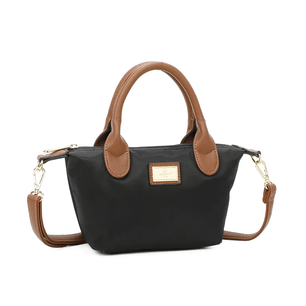 La Balade (Mini) noir vu de trois quarts : silhouette compacte évasée et attaches latérales à anneaux dorés – réf. Z-05