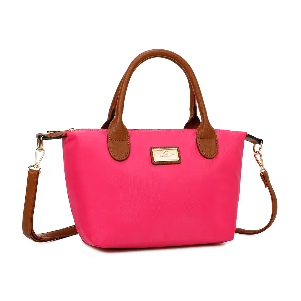 La Balade fuschia claire vue de trois-quarts : forme trapèze souple et bandoulière amovible en simili cuir camel – réf. Z-01
