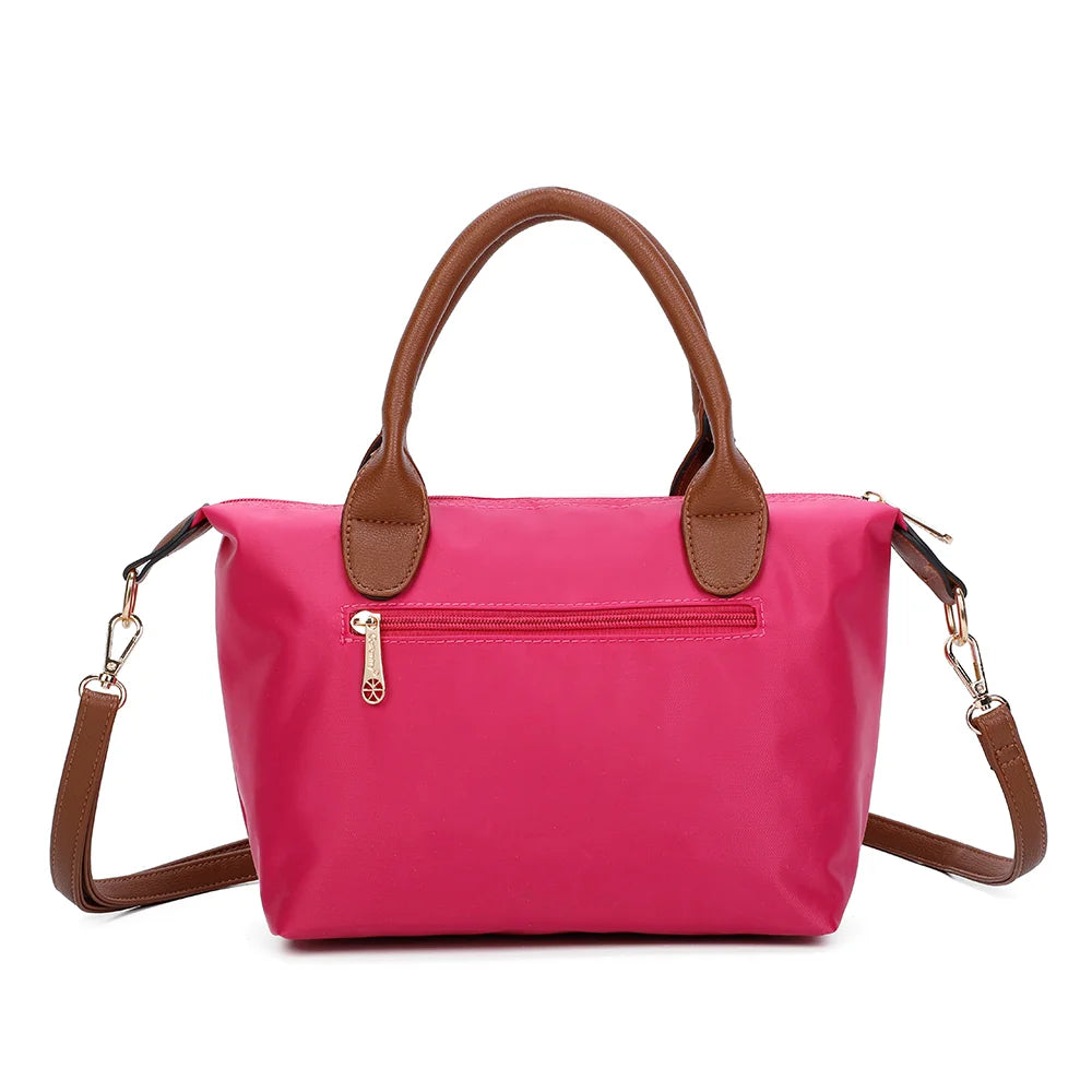 Dos de La Balade fuschia : nylon lisse et poignées en simili cuir camel – réf. Z-01