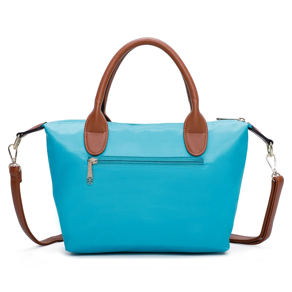 Dos de La Balade turquoise : nylon lisse et poignées en simili cuir camel – réf. Z-01