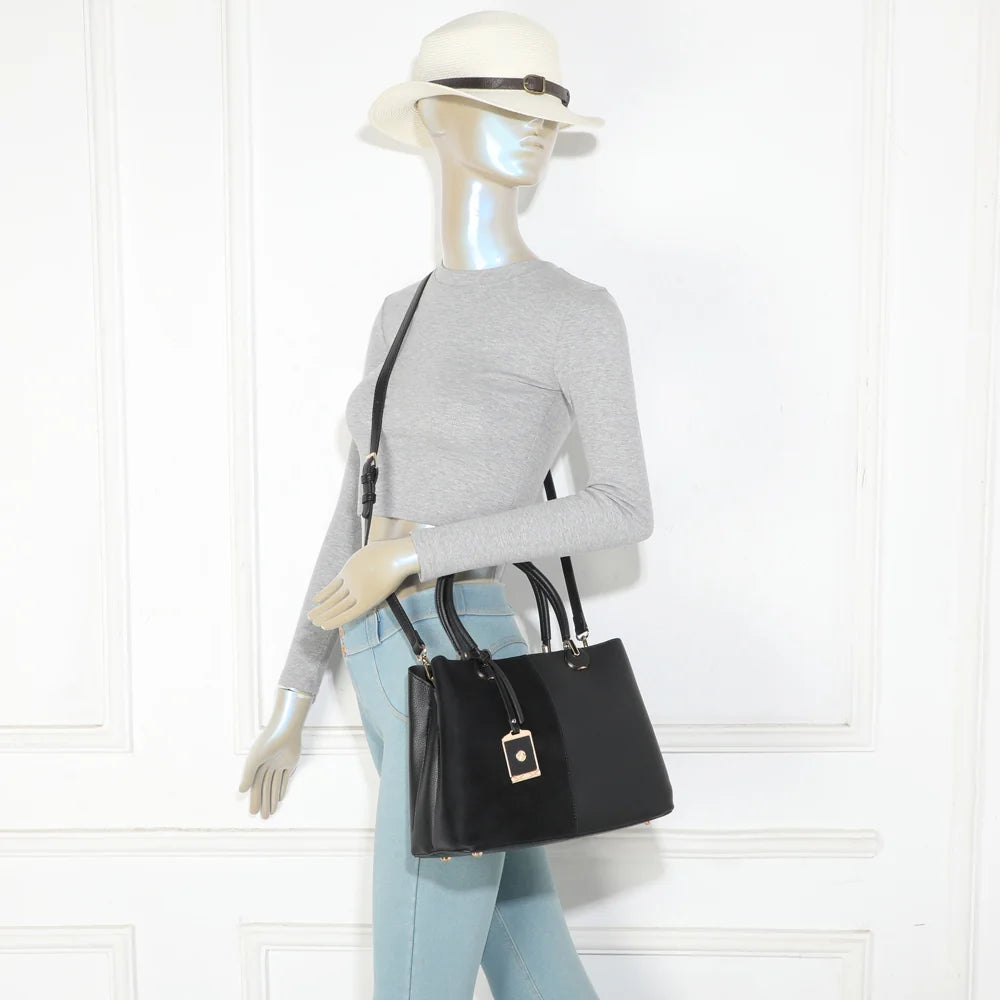 Sac à main femme La Bellamy noir porté, anses et bandoulière ajustable pour varier le porté – réf. G-7507-1