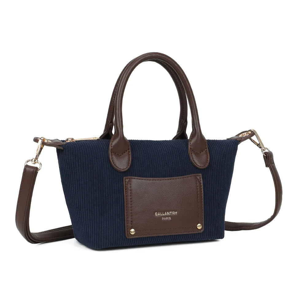 La Léandra bleu foncé vue de trois quarts : silhouette compacte, côtes verticales et anses arrondies assorties – réf. Z-05-8