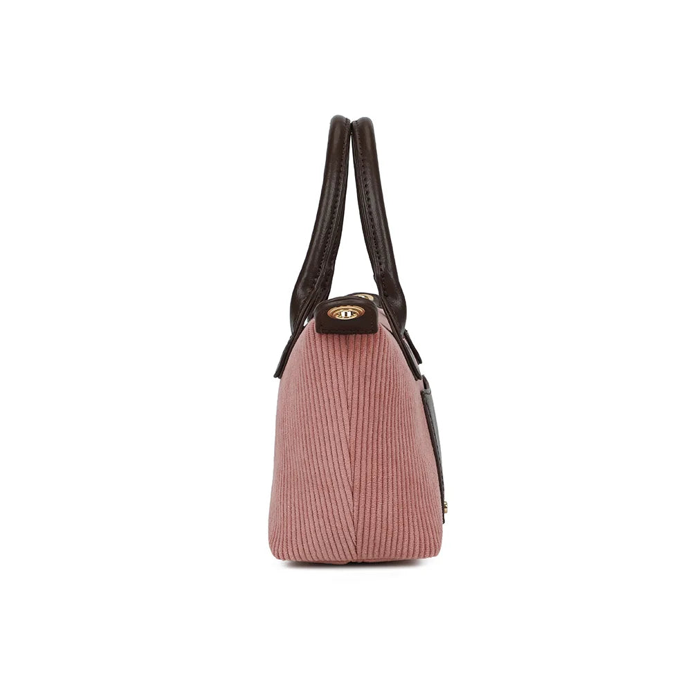 Profil du sac La Léandra rose foncé : 9 cm de profondeur et patte latérale avec anneau doré – réf. Z-05-8