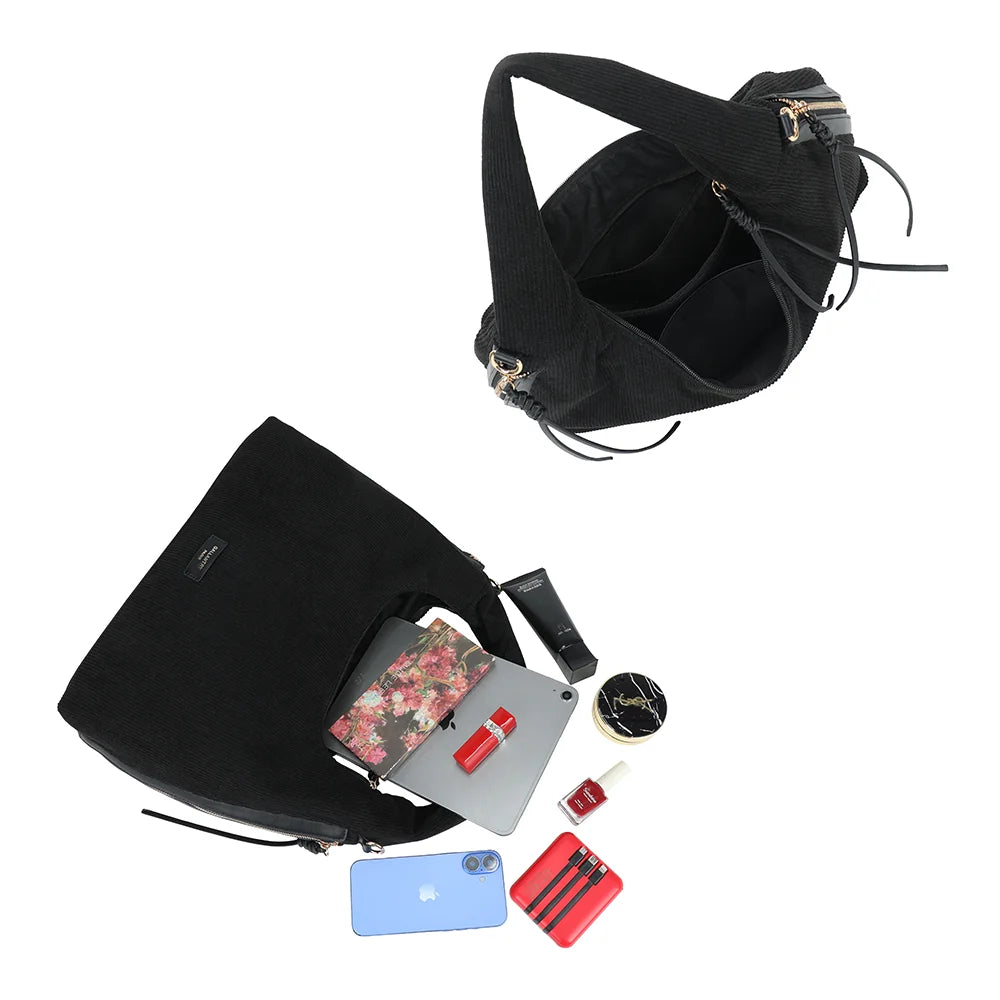 Intérieur de La Mélodie noir : grand compartiment zippé qui accueille tablette et accessoires – réf. JC-53010