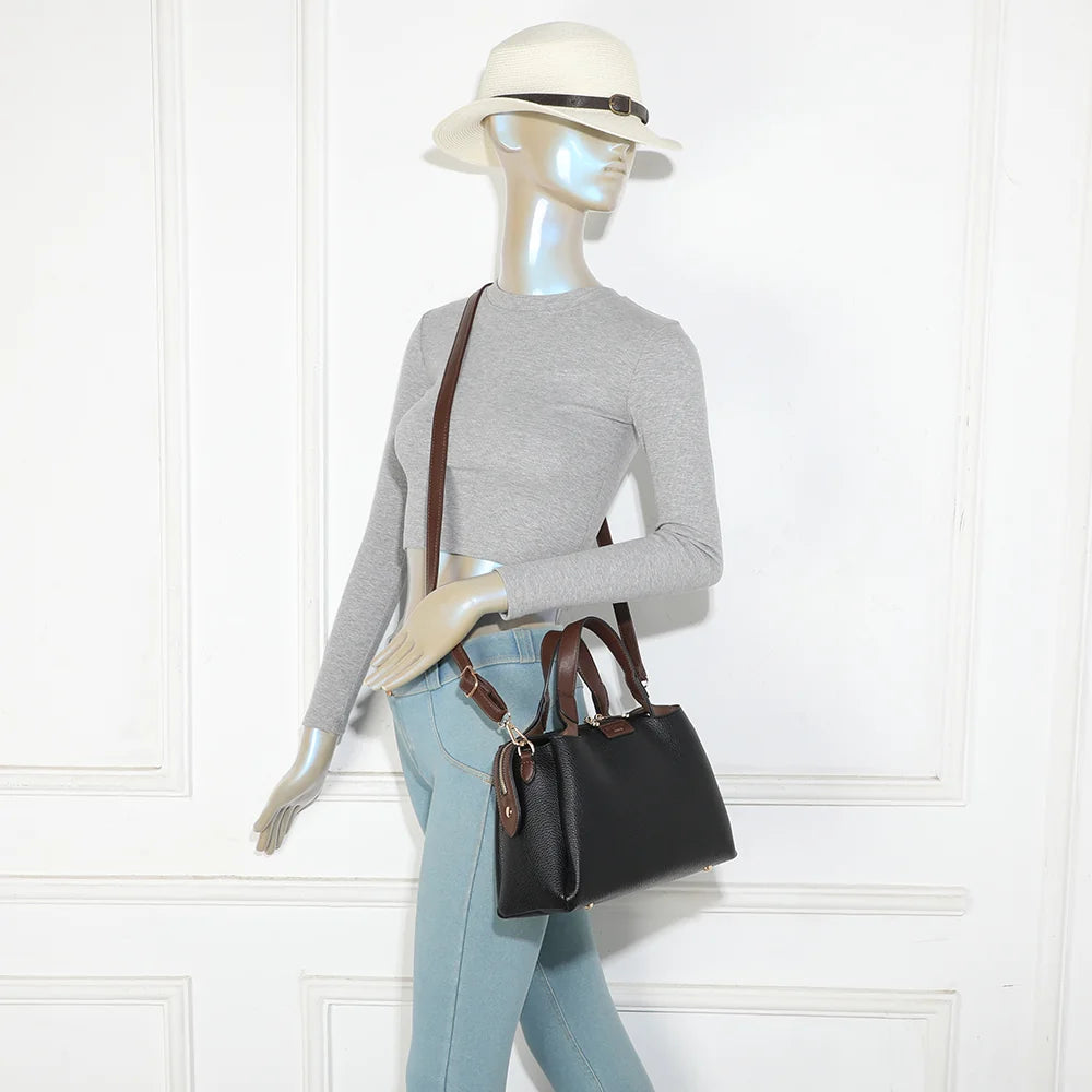 Sac à main femme La Montaigne noir porté à la main, allure chic au quotidien – réf. M-9458-1