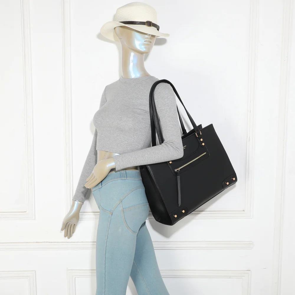 Sac cabas femme La Polaris noir porté à l’épaule grâce à ses deux anses – réf. R-2075