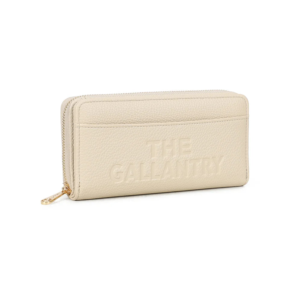 Le Compagnon Tendre beige vu de trois quarts : zip doré tout autour et tirette métallique dorée – réf. SF-69052