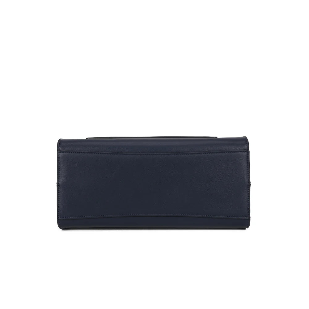 Dessous du Le Corten bleu foncé, une base rigide qui permet au sac de tenir droit une fois posé – réf. LS-76002