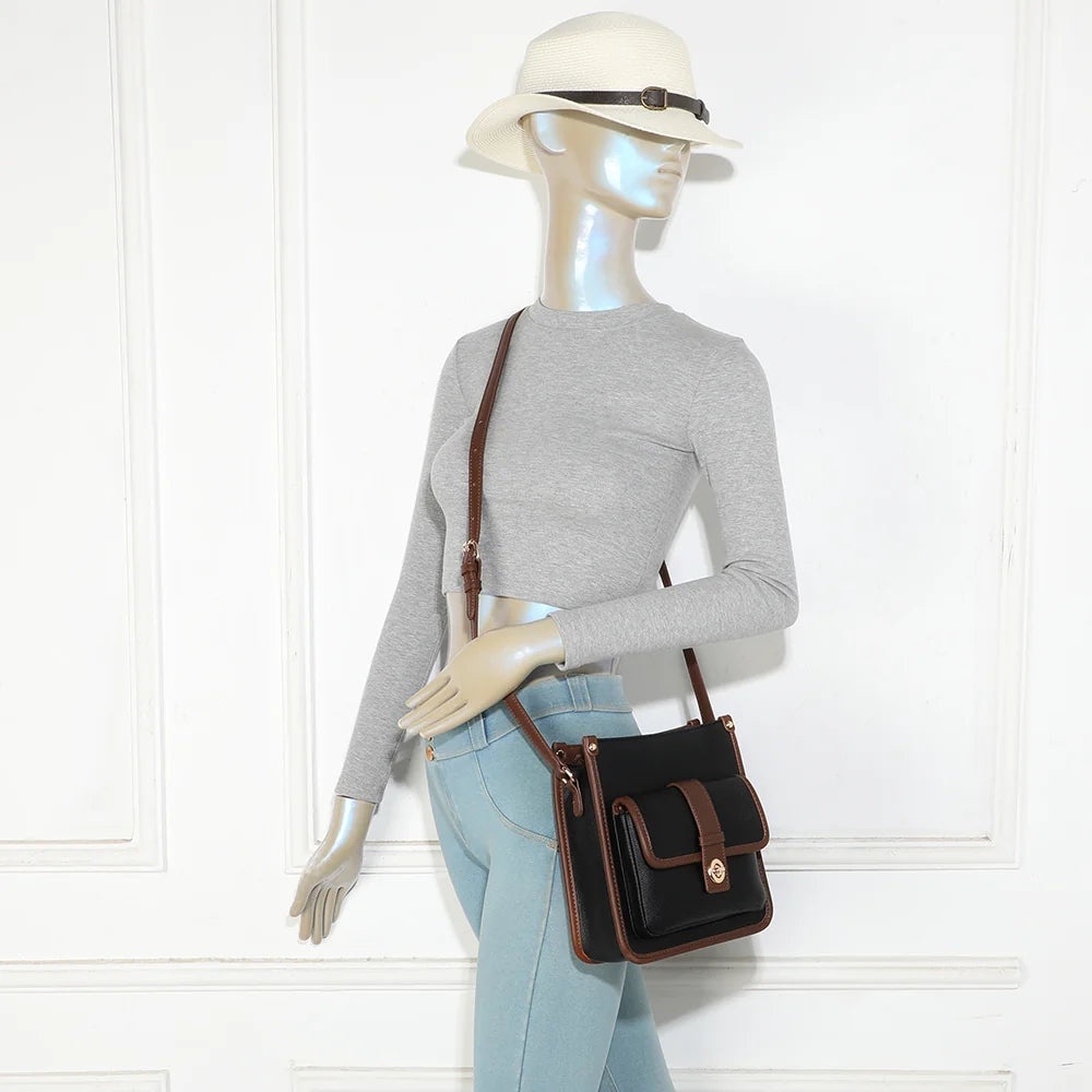 Sac bandoulière femme Le Corvès noir porté à l’épaule ou en travers du corps grâce à sa bandoulière réglable – réf. R-2071