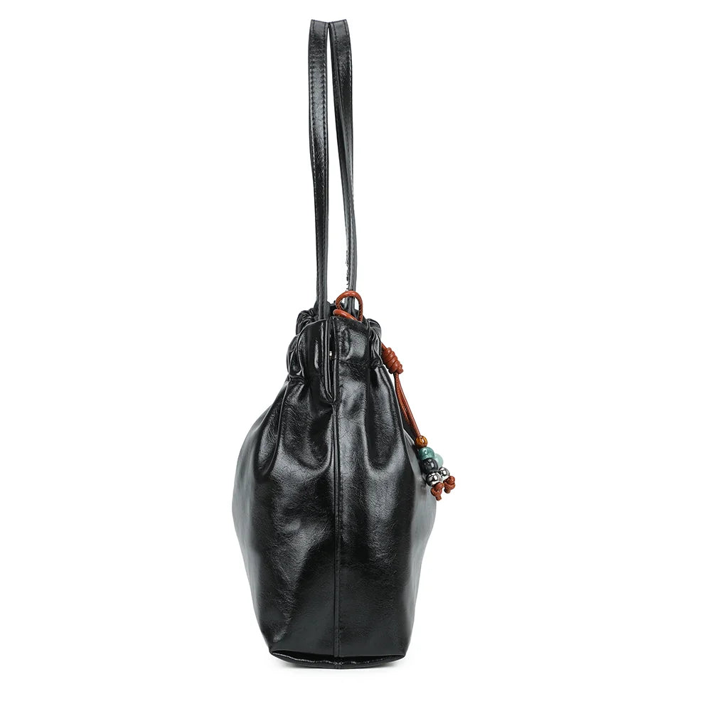 Profil du Mahé noir : côtés souples froncés en haut et profondeur de 12 cm pour vos essentiels – réf. A-9170