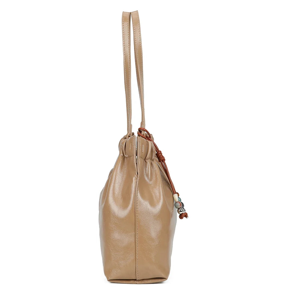 Profil du Mahé taupe foncé : côtés souples froncés en haut et profondeur de 12 cm pour vos essentiels – réf. A-9170