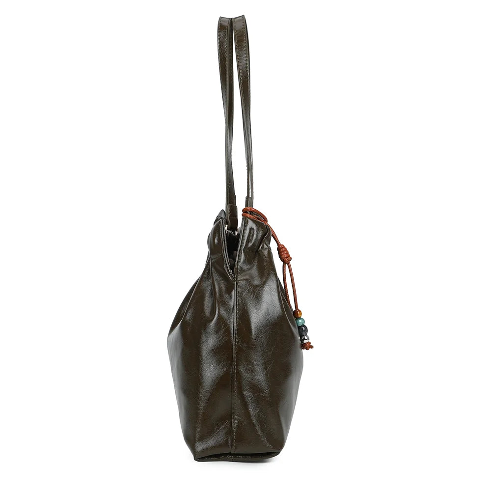 Profil du Mahé vert foncé : côtés souples froncés en haut et profondeur de 12 cm pour vos essentiels – réf. A-9170