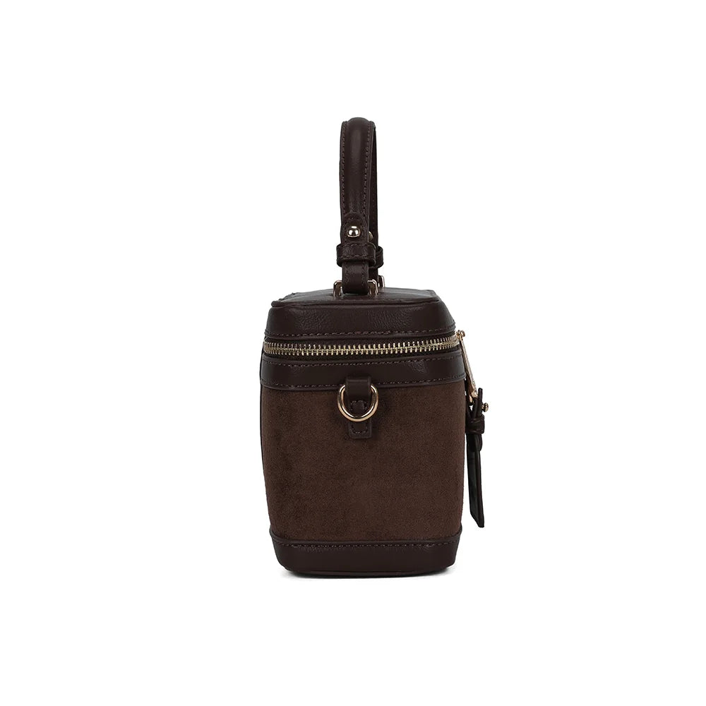 Le Nohé coffee de profil : anneau doré pour la bandoulière et format compact de 9 cm de profondeur – réf. A-9187