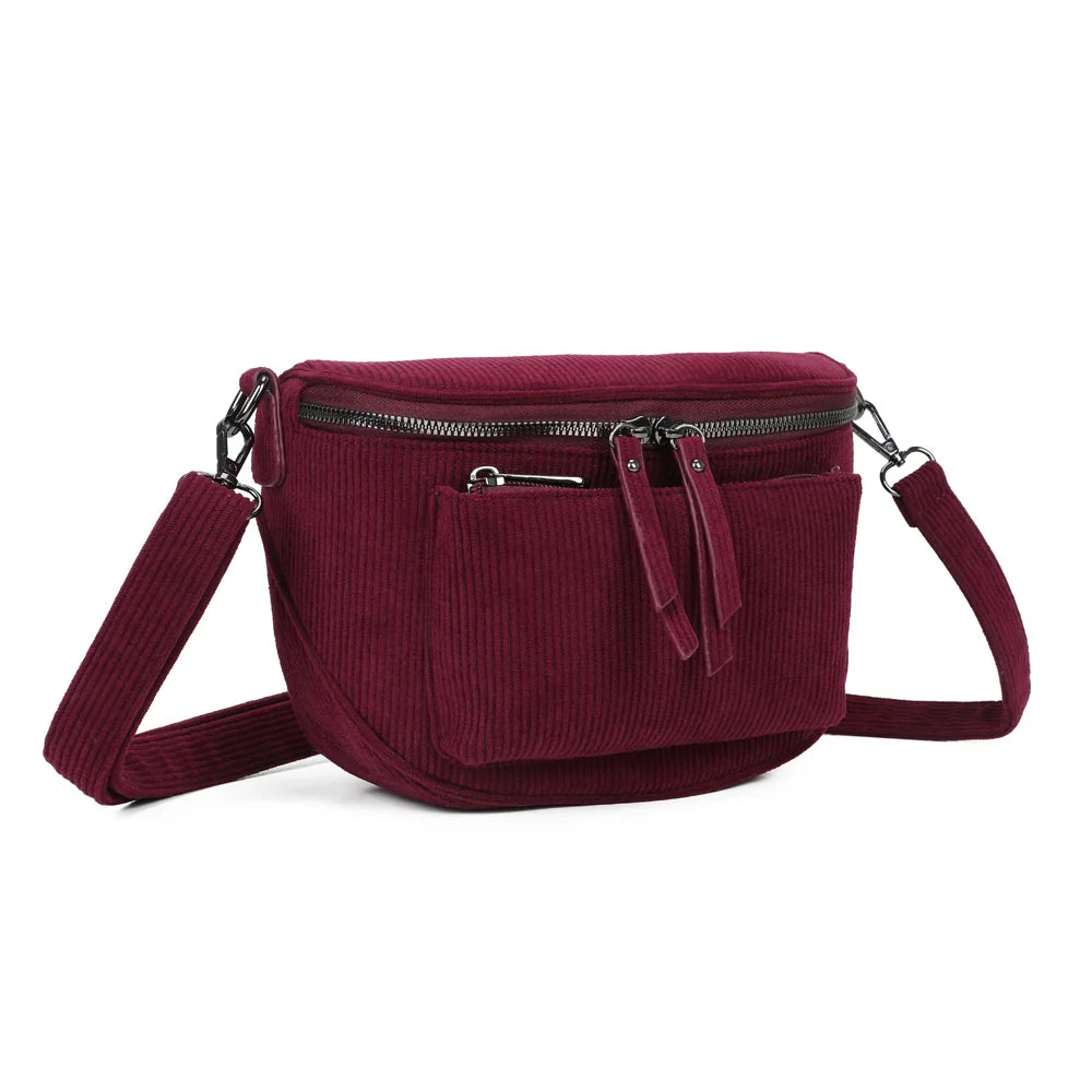 Le Sacha bordeaux vu de trois quarts : forme demi-lune compacte et zip principal à double curseur – réf. Z-83047-7