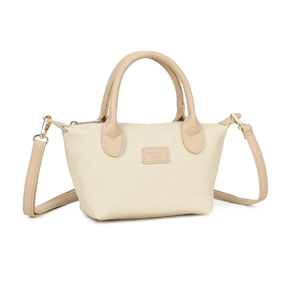 Le Soléa beige/taupe de trois quarts : silhouette trapèze et patte latérale à œillet doré – réf. Z-05-5