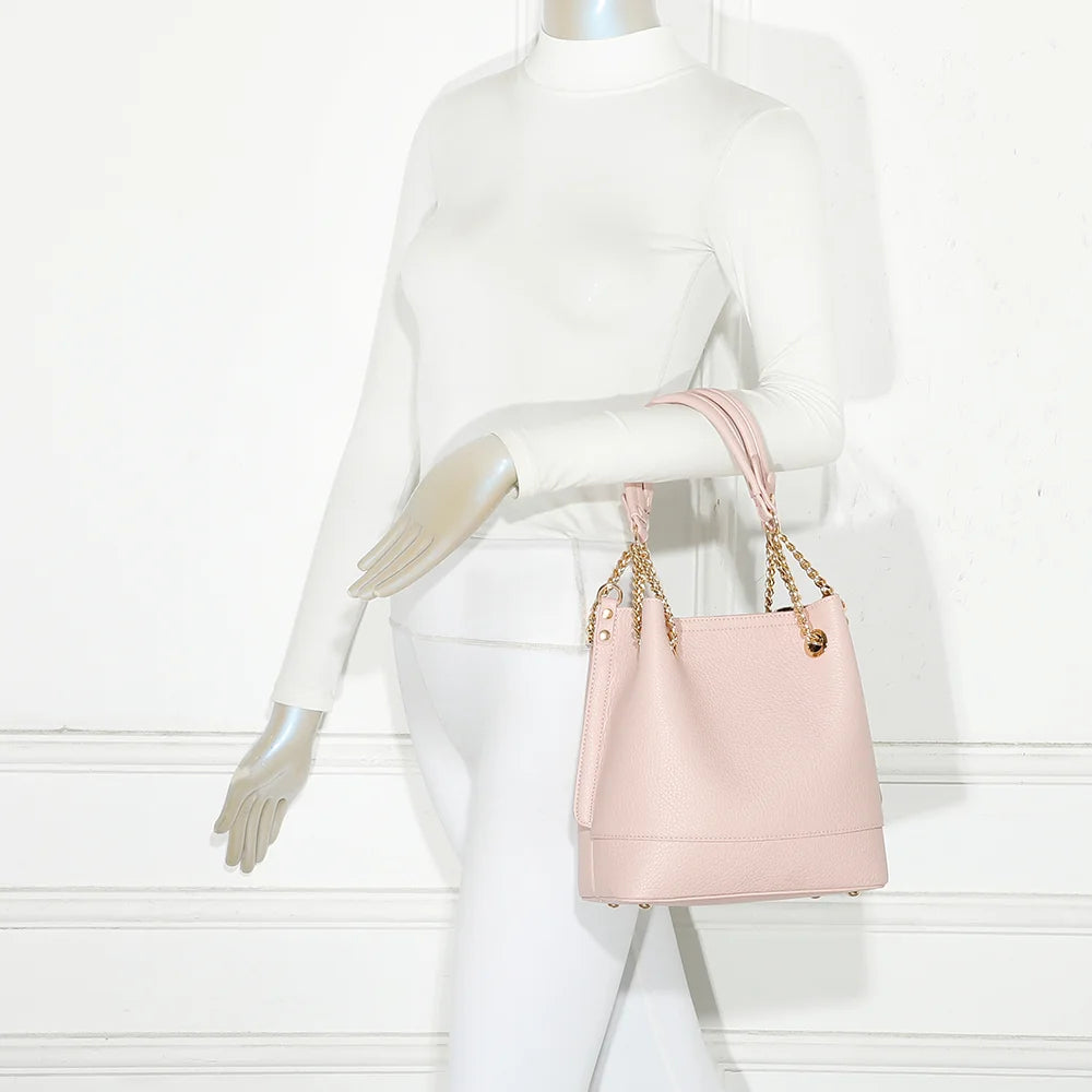 Sac à main femme Noble Line rose porté, doubles anses et chaînes dorées pour une allure chic – réf. DQ-8692-1