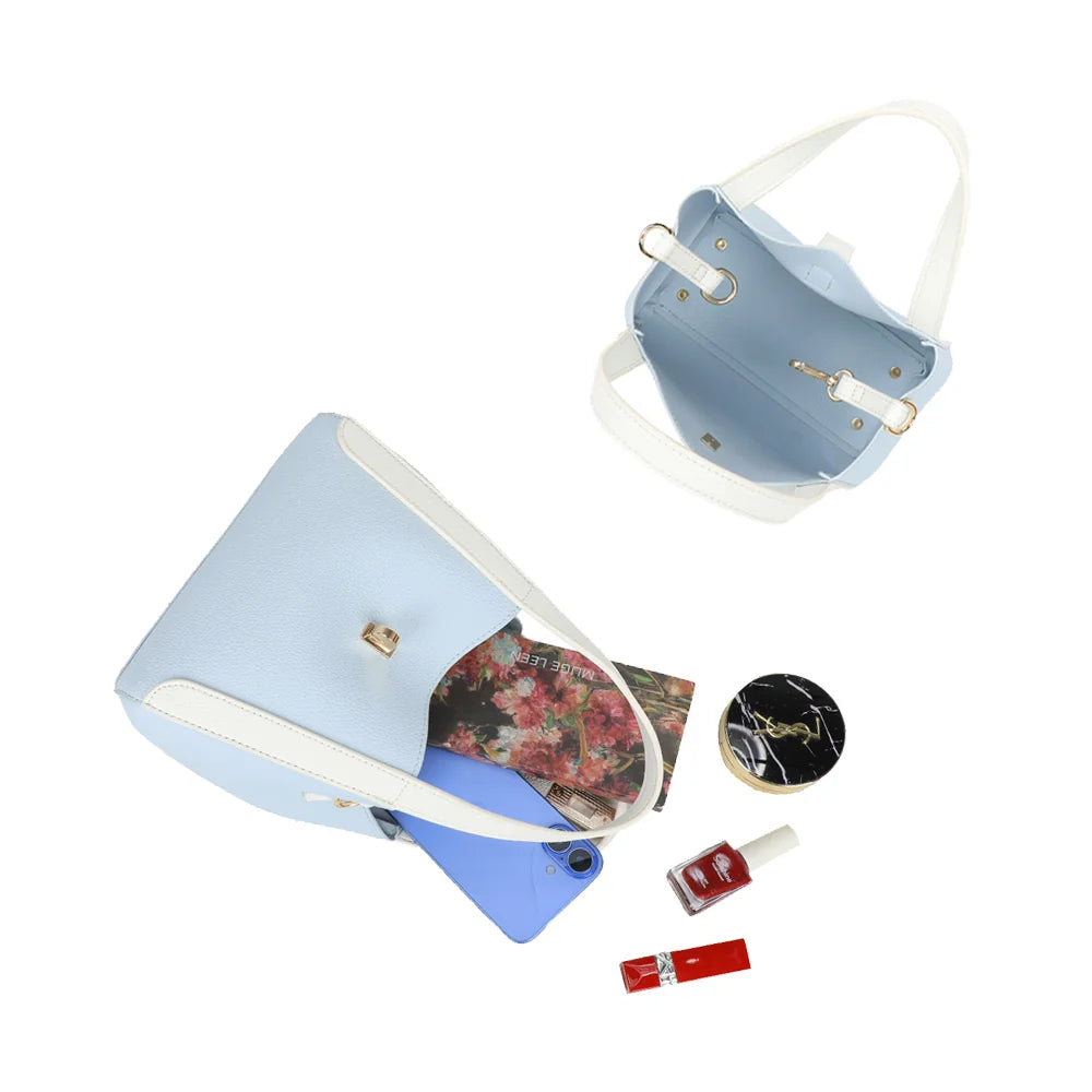 Intérieur du Nora bleu clair : compartiment principal pour téléphone, portefeuille, clés et maquillage – réf. DQ-8718