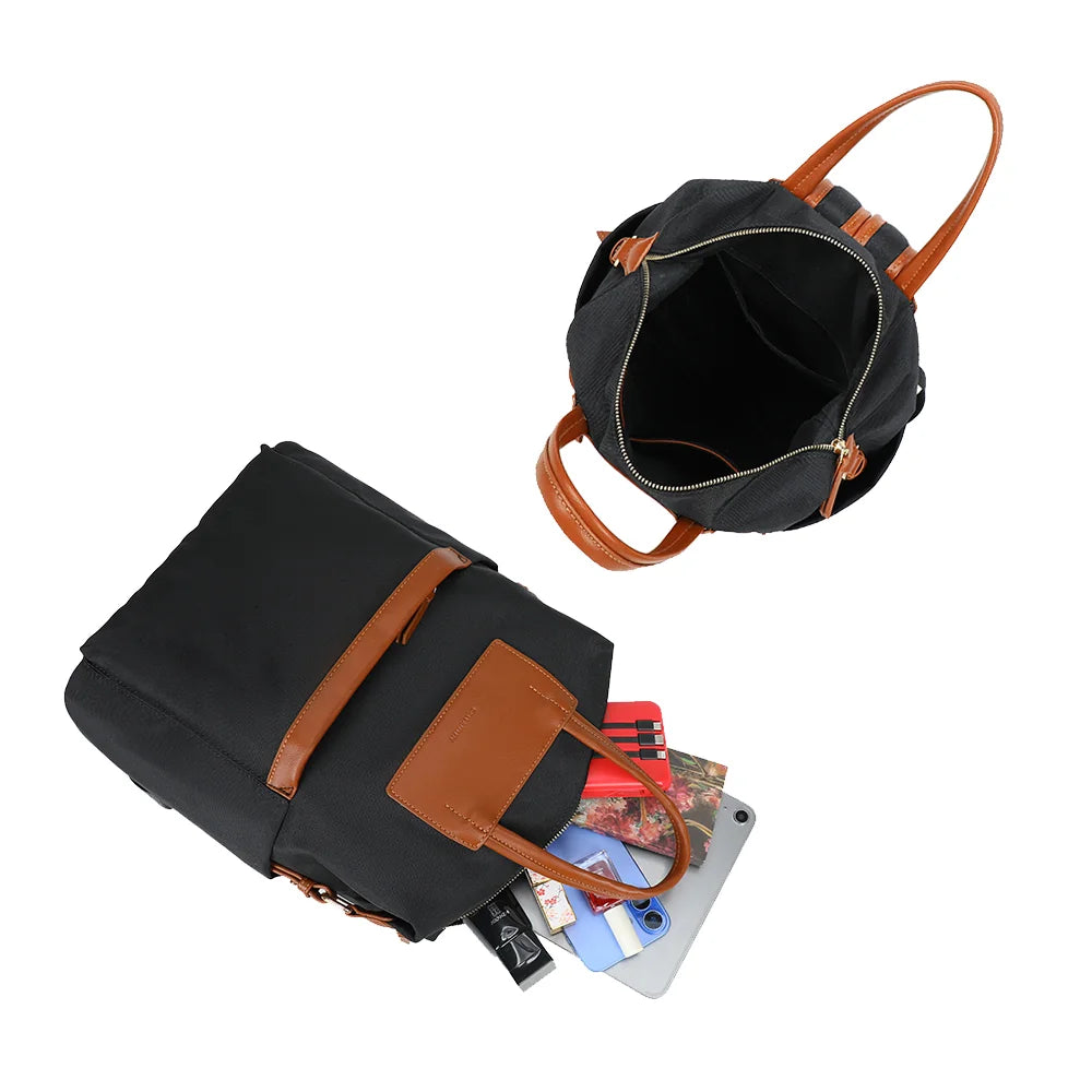 Intérieur du sac Adria noir : grand compartiment principal fermé par un zip doré – réf. A-9135