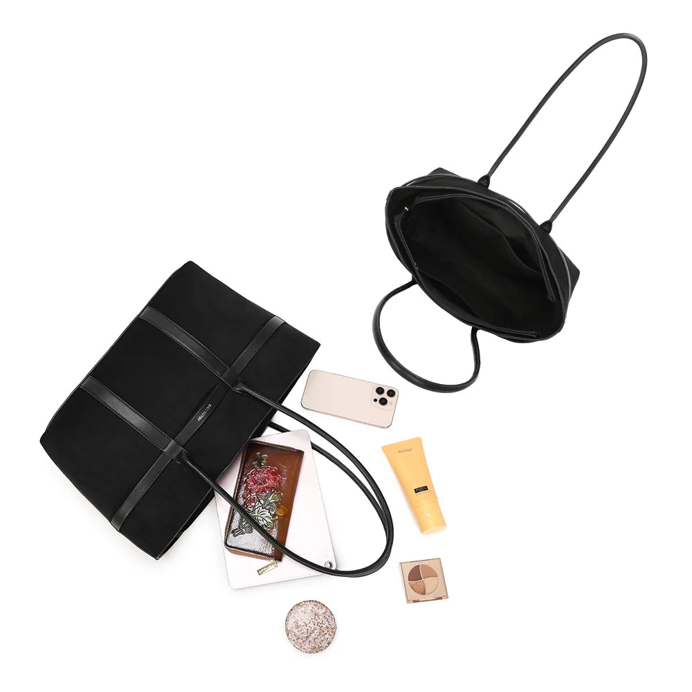Intérieur spacieux d’Althéa noir : doublure synthétique beige à motif G, place pour une tablette – réf. R-2025