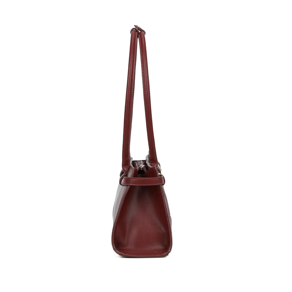 Profil du sac Amarante bordeaux : soufflet latéral lisse et 10 cm de profondeur pour l’essentiel