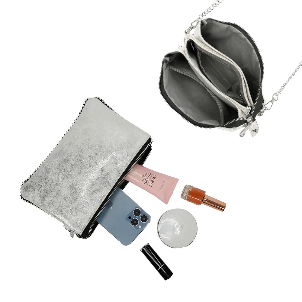 Intérieur du sac Aurora blanc : compartiments zippés pour téléphone, poudrier et rouge à lèvres – réf. KJ-62015