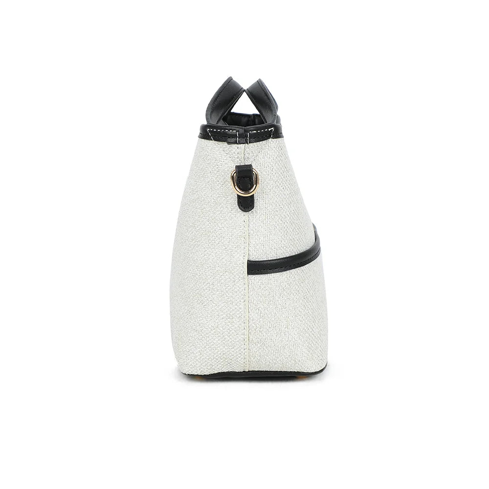 Profil du Ava Épure beige/noir : 12 cm de profondeur et attache latérale à mousqueton doré – réf. R-2026-1