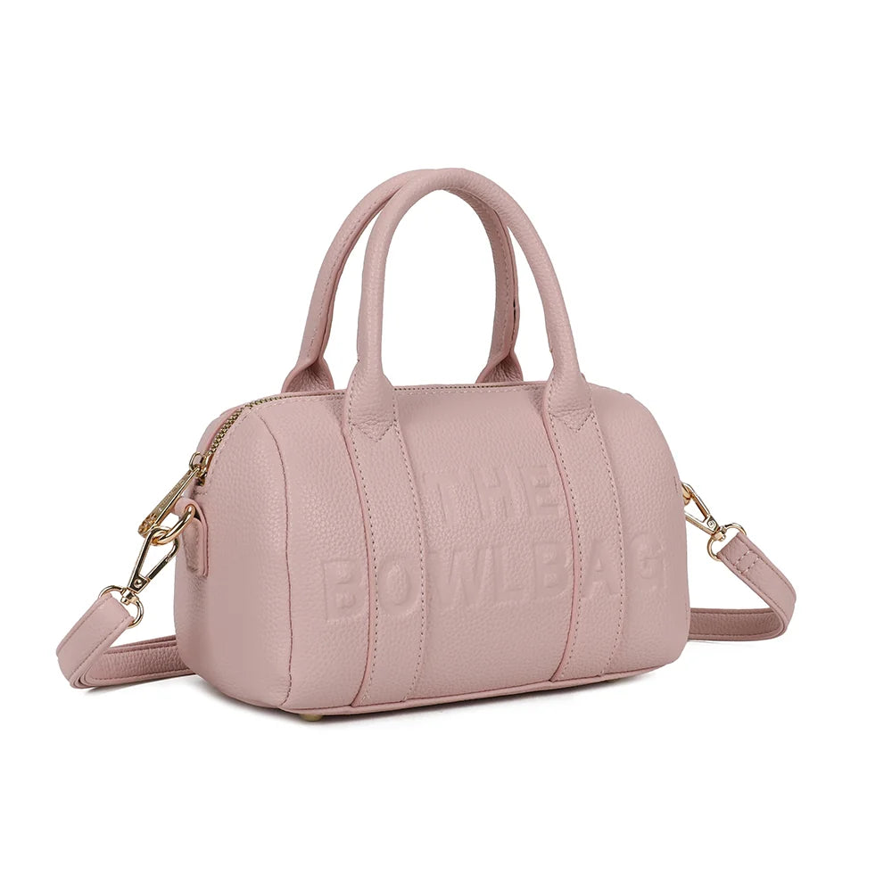 Bowlbag mini rose de trois quarts : silhouette arrondie de sac bowling et fermeture éclair dorée – réf. R-1995