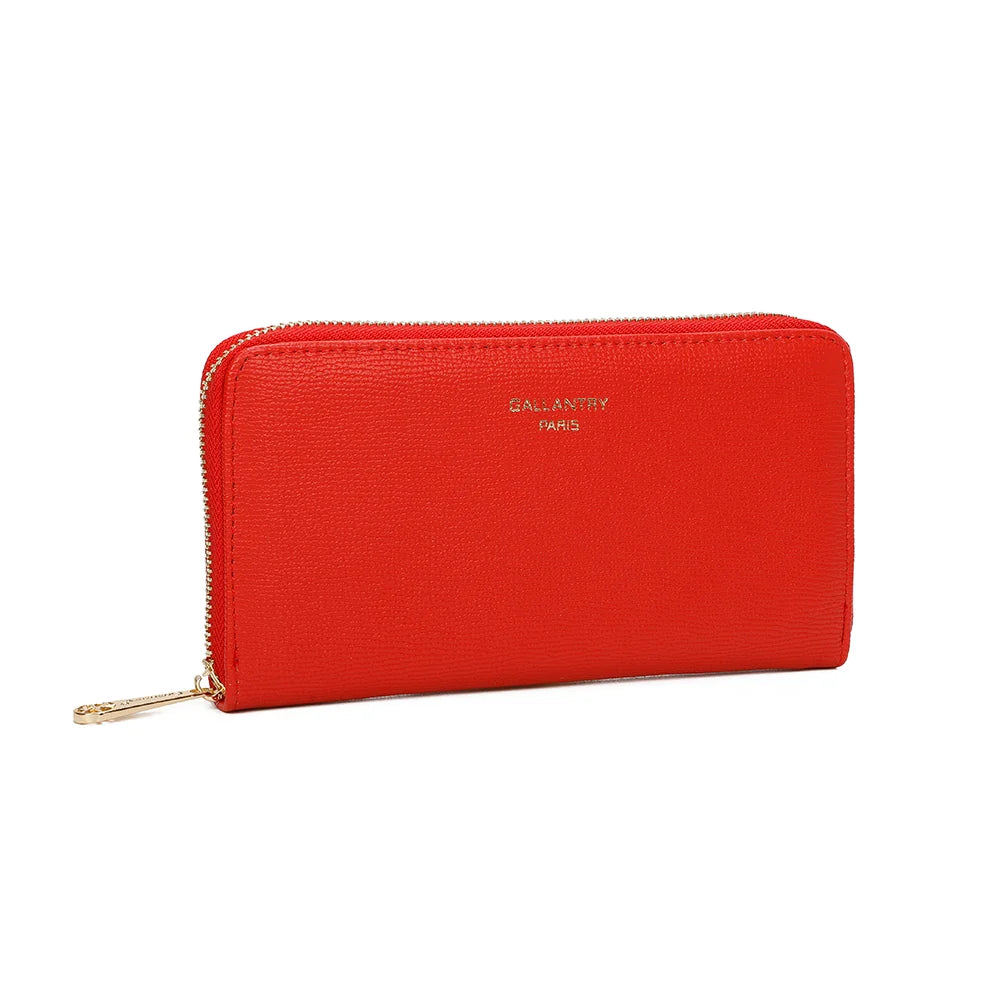 Celia Zip rouge vu de trois-quarts : fine texture striée, angles arrondis et tirette dorée – réf. L-91164-19