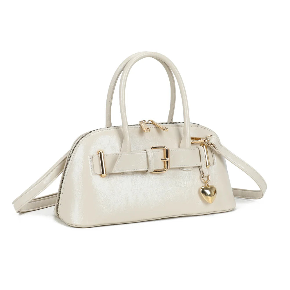 Cintura beige vu de trois quarts : silhouette arrondie, anses rondes et zip doré à double curseur – réf. KJ-62072
