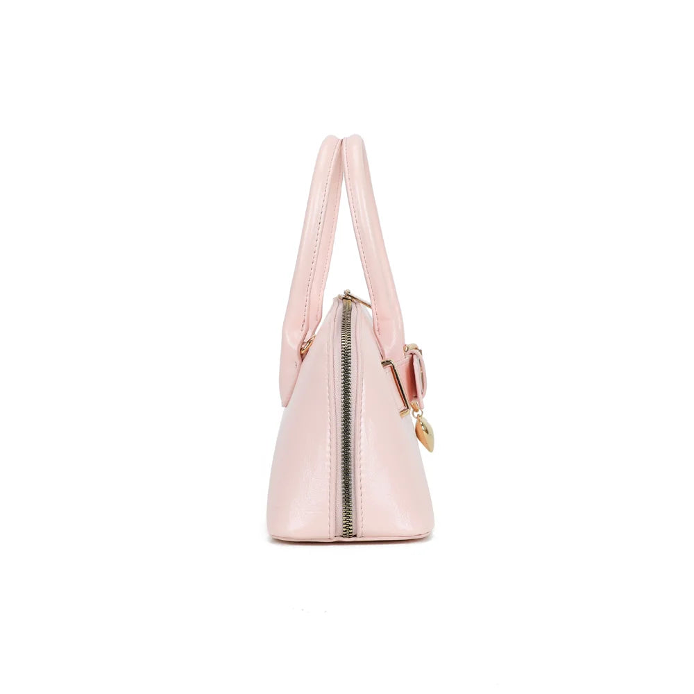 Profil du Cintura rose : forme compacte de 10 cm de profondeur, zip qui suit le haut du sac – réf. KJ-62072