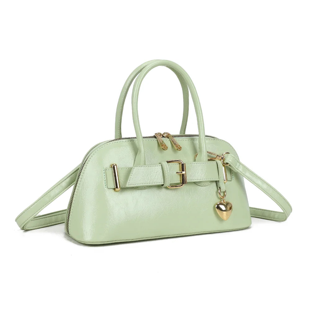 Cintura vert clair vu de trois quarts : silhouette arrondie, anses rondes et zip doré à double curseur – réf. KJ-62072
