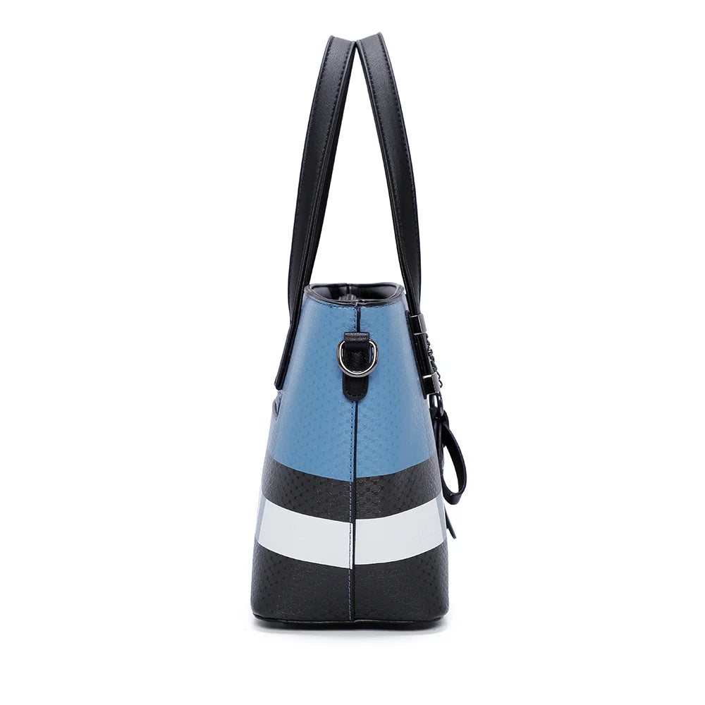 Profil du Contrast Pop bleu/noir : 12 cm de profondeur et attache latérale de la bandoulière – réf. M-9329-17