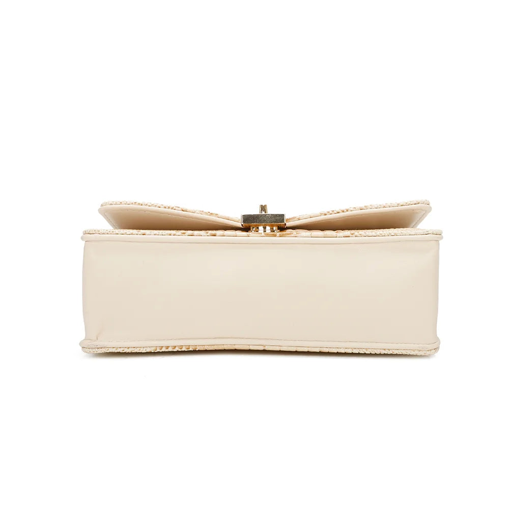 Dessous du sac Corail or, base structurée qui garde la forme du sac – réf. R-6661