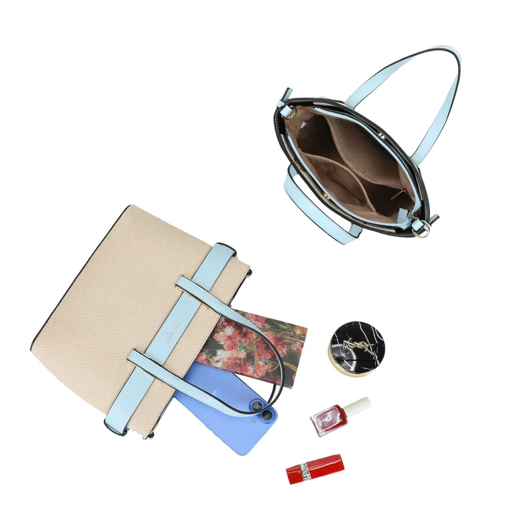 Intérieur du sac Eden bleu clair : compartiment zippé et poches pour téléphone, carnet et maquillage – réf. DQ-8714-1