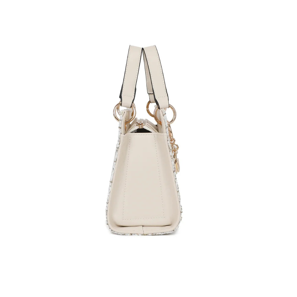 Élia beige clair de profil : soufflets latéraux lisses et silhouette structurée de 10 cm de profondeur – réf. C-0169-5