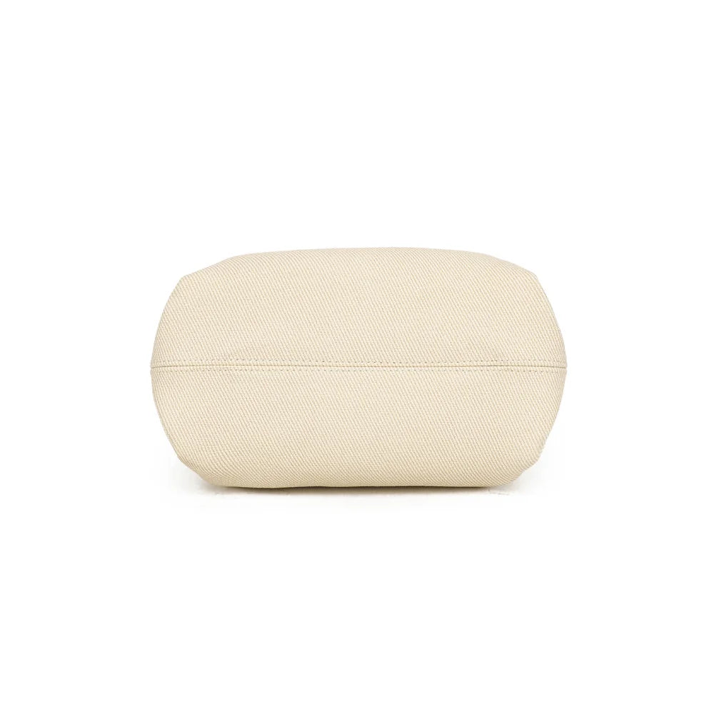 Dessous du sac Esmée jaune, une base structurée qui garde bien la forme du sac – réf. A-9156-1