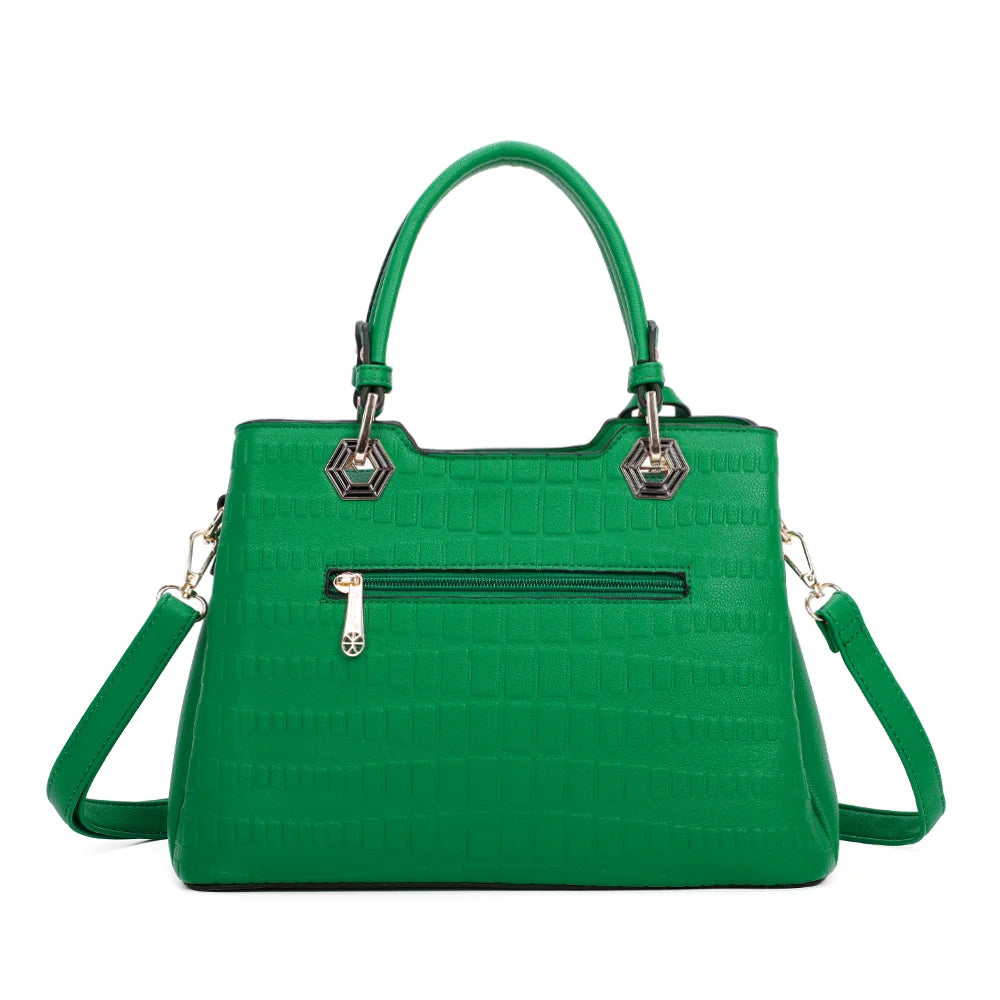 Dos du Fiora vert, motif embossé façon croco sur toute la surface et anses de 14 cm – réf. M-9354