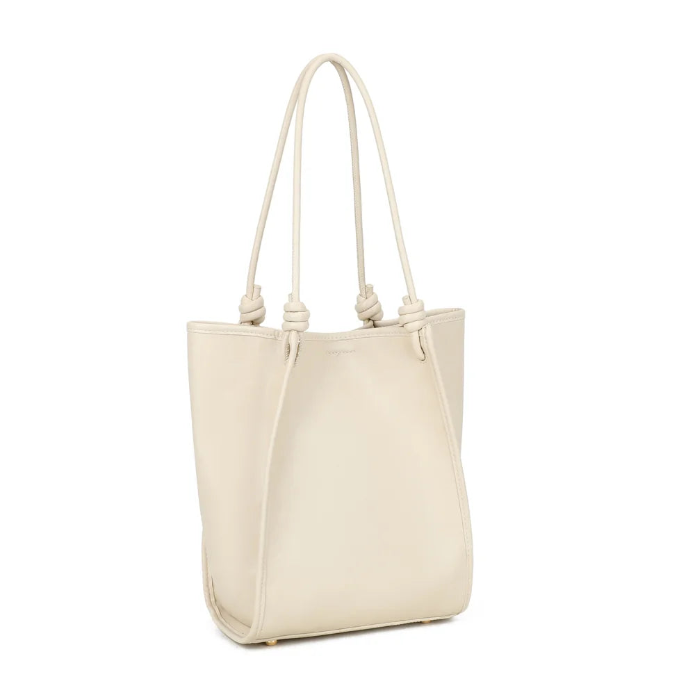 Florence beige vu de trois quarts : silhouette cabas souple soulignée de passepoils ton sur ton – réf. A-9455-1