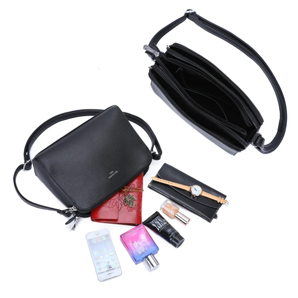 Intérieur du Gallante noir : plusieurs compartiments zippés pour ranger téléphone, carnet et maquillage – réf. G-7432-2