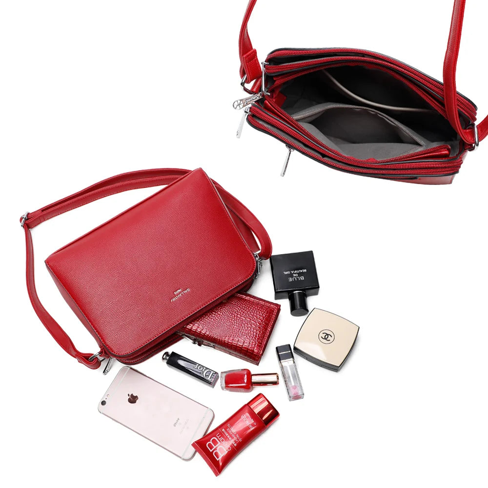 Intérieur du Gallante rouge foncé : plusieurs compartiments zippés pour ranger téléphone, carnet et maquillage – réf. G-7432-2